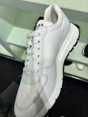 Sneakers en cuir blanc à semelle oversize contrastante
