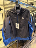 Veste coupe-vent légère bicolore noir et bleu