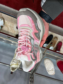 Sneakers runner techniques rose et gris