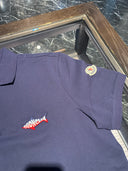 Polo piqué bleu marine à logo poisson brodé