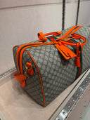 Sac de voyage GG Supreme beige et orange avec bande Web