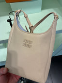 Sac seau en cuir grainé beige sable petit format
