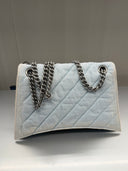 Sac porté épaule Crush Chain Medium en denim matelassé bleu clair