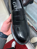 Mocassins plateforme en cuir noir GG embossé