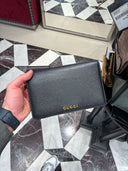 Portefeuille chaîne en cuir grainé noir