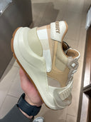 Sneakers épaisses à bride logo et empiècements check beige clair