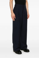 Pantalon à plis sur le devant