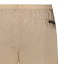 Short de bain beige avec logo en caoutchouc noir